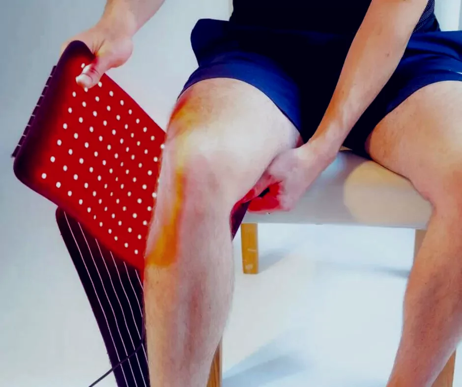 A red light therapy panel in use at Active Recovery Center
